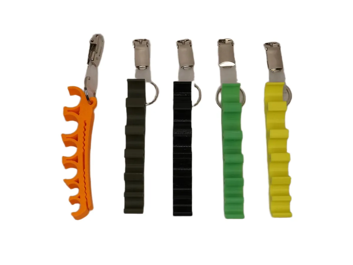 Fünf Spritzenhalter 1.0 mit Clip in Orange, Olivgrün, Schwarz, Grün und Gelb